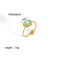 Detailed macro view of 18K gold plated sunflower ring with turquoise bead and twisted band - Adjustable Open / Sunflower Sky Blue Gem Style (YYR023065-B)