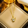 Elegant gold bow pendant necklace with sparkling round crystal in a luxury jewelry box - 8828 Gold And White