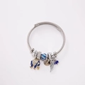 Adjustable stainless steel bangle with blue elephant and angel wing pendants - Blue