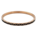 Macro detail of rose gold stainless steel bangle with black enamel triangle geometric patterns - Black Rose
