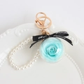 Preserved blue rose in clear ball keychain with white pearls and gold lobster clasp - Teal Blue