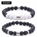 Detailed macro view of Scorpio beaded bracelets with lava stone and white turquoise beads - Scorpio