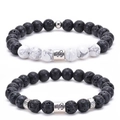 Detail of Capricorn bracelet set featuring white turquoise and black volcanic lava stone - Capricorn