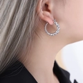 Silver heart-shaped hoop earrings featuring connected small hearts in minimalist style - F901 Heart Steel Color Earrings