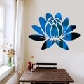 Blue mirror 3D lotus wall sticker decor on beige wall above a wooden table - Blue