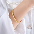 Chic hip-hop style golden chain bracelet featuring oval metal links on female wrist - Z280 - Disc Style / Gold - Disc Connected
