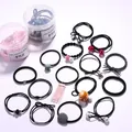 15-piece black elastic hair tie set with assorted decorative charms and storage jars - 32# Versatile Black 15-piece Set