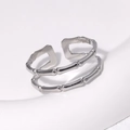 Minimalist double layer bamboo knot open ring in silver stainless steel on white plate - Adjustable / Silver