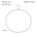 Macro detail of 2mm 18K gold-plated stainless steel bead chain with lobster clasp - 2mm
