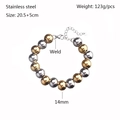 Detailansicht der 14mm Edelstahlperlen und des Karabinerverschlusses am Armband - 14mm / Gold und Silber Zweifarbig