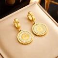 Vintage gold coin earrings with portrait relief and sparkling crystal halo on jewelry box - Gold
