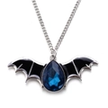Detailed shot of a silver bat pendant with black enamel wings and a blue pear-shaped gem - Blue