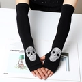 Black knitted arm warmers featuring a silver rhinestone skull design with thumb holes - 40 (Long Style) / White