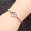 Hamsa Hand beaded bracelet with multi-color zircon and tri-color metal beads on wrist - Hamsa Hand Style 3