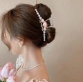 Silver metal hair claw clip with white pearls and pink flowers on a female model - Light Pink Pearl Ball-YZAP45-23
