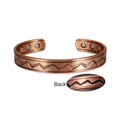 Detail view of adjustable magnetic copper bracelet with zigzag texture and healing magnets - Copper