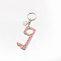 Macro detail of acrylic door opener with pink rose floral pattern and metal keyring - 9# Rose