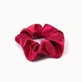 Detailed close-up of dark red satin scrunchie showing glossy texture and silk folds - Burgundy