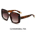 Square tortoiseshell sunglasses with brown gradient lenses and gold metal details C2 - Tortoiseshell Frame Gradient Tea Lens