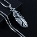 Gothic style necklace with a detailed large feather pendant and skull design - Skull Feather + Steel Chain