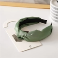Olive green knotted satin headband for women with elegant glossy finish and black lining - Green
