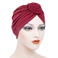 Elegant burgundy turban hat for women featuring a 3D spiral donut rose knot design - Burgundy