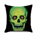 Detail of square cushion cover with green skull and pink eyes print on black background - Artistic Green Skull Pattern