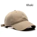 Khaki cotton baseball cap with curved brim and adjustable strap in a 45-degree side view - Adjustable / Khaki