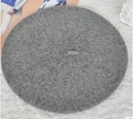 Detailed flat lay of a solid grey wool felt beret on a vintage lace background - 52-54cm / Heather Grey