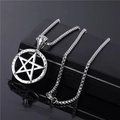 Detailed close-up of a silver stainless steel cuban chain necklace with a star pendant - Round Star Pendant
