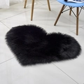 Plush heart-shaped area rug in black finish with soft fluffy texture for home decor - Black
