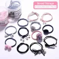 12-piece set of elegant hair ties featuring pearls and bows in a clear storage jar - 35# Delicate Mixed Color 12-piece Set