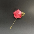 Close-up of pink satin rose brooch with golden hollow leaf and long needle pin - Watermelon red