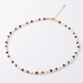 Minimalist vintage beaded necklace with tiger eye stones and black agate on white background - Multicolor Mixed Beaded