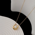 Minimalist 18K gold U-shaped necklace with white pearl on a fine crossbody chain - Gold