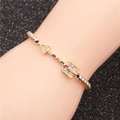 Braided bracelet with colorful zircon arrow charm and tri-color metallic beaded chain - Arrow