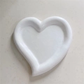 Minimalist white heart-shaped ceramic jewelry tray with a smooth matte finish - White Heart
