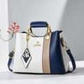 Three-color patchwork tote bag with gold metal handle and butterfly tassel pendant - White Blue Chain Print