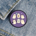 Close-up of cute cartoon ghost pins with BOO text on blue denim fabric background - Purple Background Multiple Ghosts BOO Style (XZ6934)