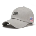 Unisex grey baseball cap featuring USA embroidery and American flag patch for outdoor - One Size / Light Gray