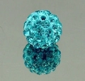 Macro shot of a blue crystal disco ball bead with rhinestones for jewelry making - Lake Blue