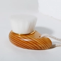 Detail of wooden facial brush with white fibers, gold metal ring, and beige cotton cord - Gold Ring Flat Head