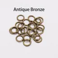 Detailed view of antique bronze DIY jewelry jump rings for necklace and earring links - 0.5*3mm (200Pcs/Pack) / Antique Bronze