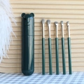 Detailed view of 5-piece makeup brush set with dark green bear storage holder - 5 Pcs + Tube / Avocado Green
