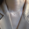 Minimalist 925 silver 14k gold plated necklace with small zircon pendant on a model - Adjustable Length / 14K Gold