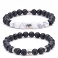 Detail of Leo zodiac bracelets featuring natural lava stone and white turquoise beads - Leo