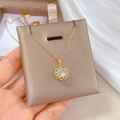 Elegant gold titanium steel necklace featuring a rotating zircon pendant with woven texture - Stainless Steel Chain Copper Micro-set Pendant(F122)