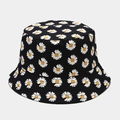 Dettaglio del cappello a secchiello in cotone nero con stampa di margherite bianche e gialle - M(56-58cm) / Nero Margherita Reversibile