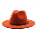 Detail of orange wool fedora hat featuring a brown leather band and gold metal buckle - M (56-58cm) / Rust red