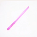 Close-up of a pink plastic glowing LED wand accessory for parties and concerts - Pink